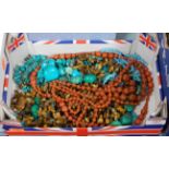 A box of miscellaneous mainly costume jewellery to include malachite bead necklace, faux coral
