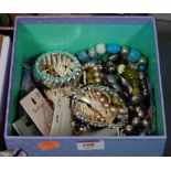 A box of mainly modern costume jewellery to include various bangles, bead necklaces, etc