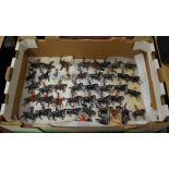 A box of assorted Britains painted lead figures of soldiers on horseback, approx 70