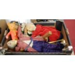 A box containing four various puppets, and a Rupert the bear toy