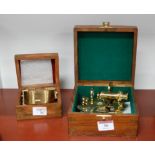 A modern West Falia miniature brass sextant in fitted brass bound case together with a