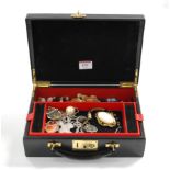 A leather clad jewellery box and contents, to include shell carved cameo brooch, pinchbeck set
