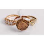 A modern 9ct gold dress ring, inset with a small coin; together with a 9ct gold and diamond point