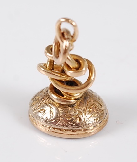 A yellow metal and carnelian set fob pendant, having plain carnelian set matrix, in engraved - Image 2 of 2