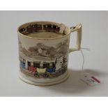 A Victorian tankard transfer decorated with a steam train and carriages, printed mark verso '