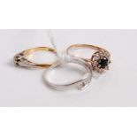 An 18ct gold and platinum diamond solitaire ring, the small old cut diamond in an illusion