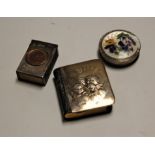 An Edwardian silver clad miniature book of prayer, the front cover relief decorated with putti,