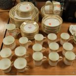 A modern Elizabethan 8-place setting dinner and tea service in the Swiss Cottage pattern