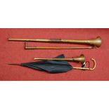 A copper hunting horn, together with one other, a riding crop, and a parasol (4)