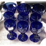 A set of six Bristol blue pedestal drinking glasses together with three other larger examples (9)