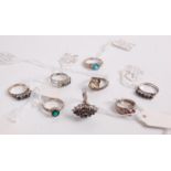 A collection of various silver, paste and semi-precious set dress rings (8)