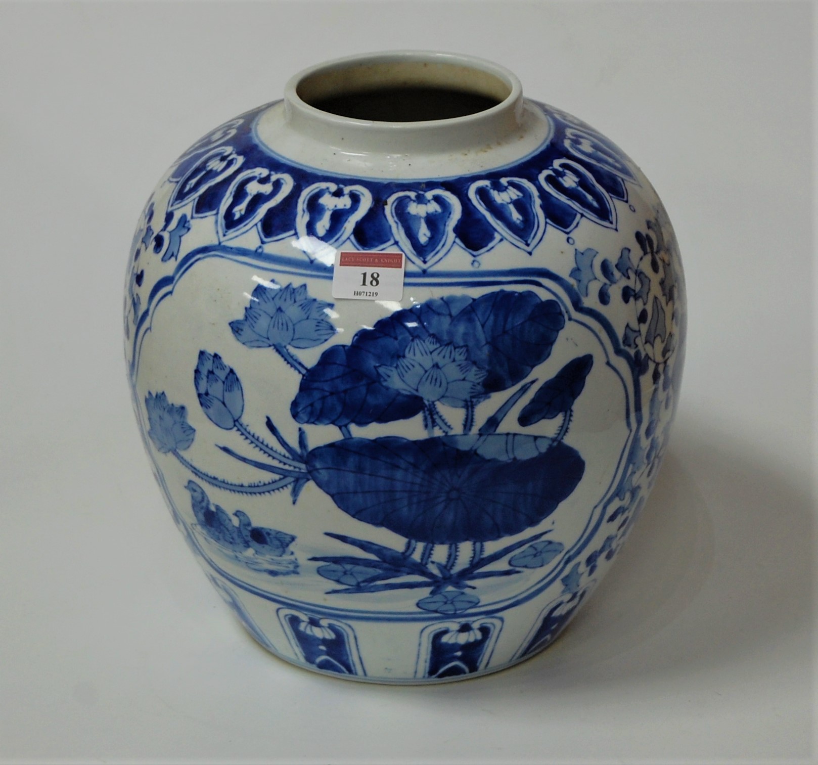 A large blue & white vase of squat circular form decorated with birds amongst foliage, height 29cm