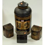 A large Toleware tea canister, gilt decorated with Chinese symbols, numbered 15, h.48cm; together