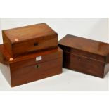 A 19th century mahogany tea caddy, together with two other similar boxes