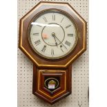 A Victorian rosewood octagonal drop-trunk wall clock, the circular enamelled dial signed Seth