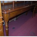 A Victorian style joined oak long ledgeback servery, with rounded corners and raised on turned