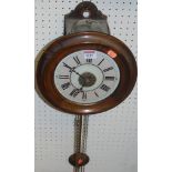 A Victorian walnut postman's alarm clock, having weight driven movement, with pendulum