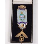 A mid-20th century silver gilt and enamelled Masonic jewel, having a typical set square pendant