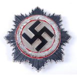 A German Deutches Kreuz in silver, of four rivet construction marked 1 to the pin for Deschler,