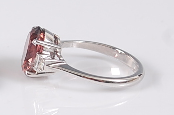 A white metal, pink tourmaline and diamond ring, featuring an oval pink tourmaline in a four-claw - Image 2 of 2