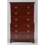 A George III mahogany chest-on-chest, the plain moulded cornice over top fitted with three long