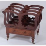 An early Victorian mahogany three-division music canterbury, the shaped fretwork cut divisions