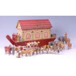 An early 20th century German painted wooden Noah's Ark, together with numerous (mostly) pairs of