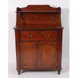 A late Regency mahogany secretaire, having raised superstructure over fitted secretaire drawer