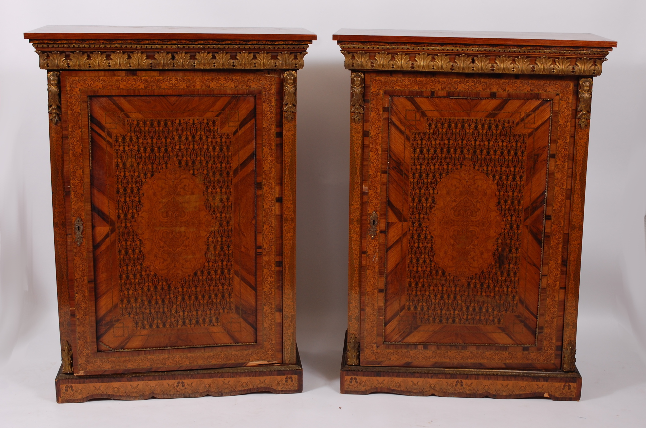 A pair of 19th century French rosewood and fine specimen marquetry inlaid cabinets, each having