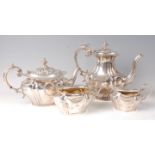 A late Victorian silver four-piece tea and coffee set, comprising teapot, coffee pot, twin handled