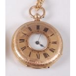 A 14ct yellow gold keywind half hunter pocket watch, with white enamel Roman dial and case with