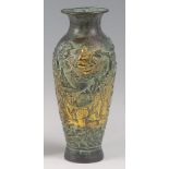 A Chinese bronze baluster form vase, all over cast with eight immortals each with gilt patina,