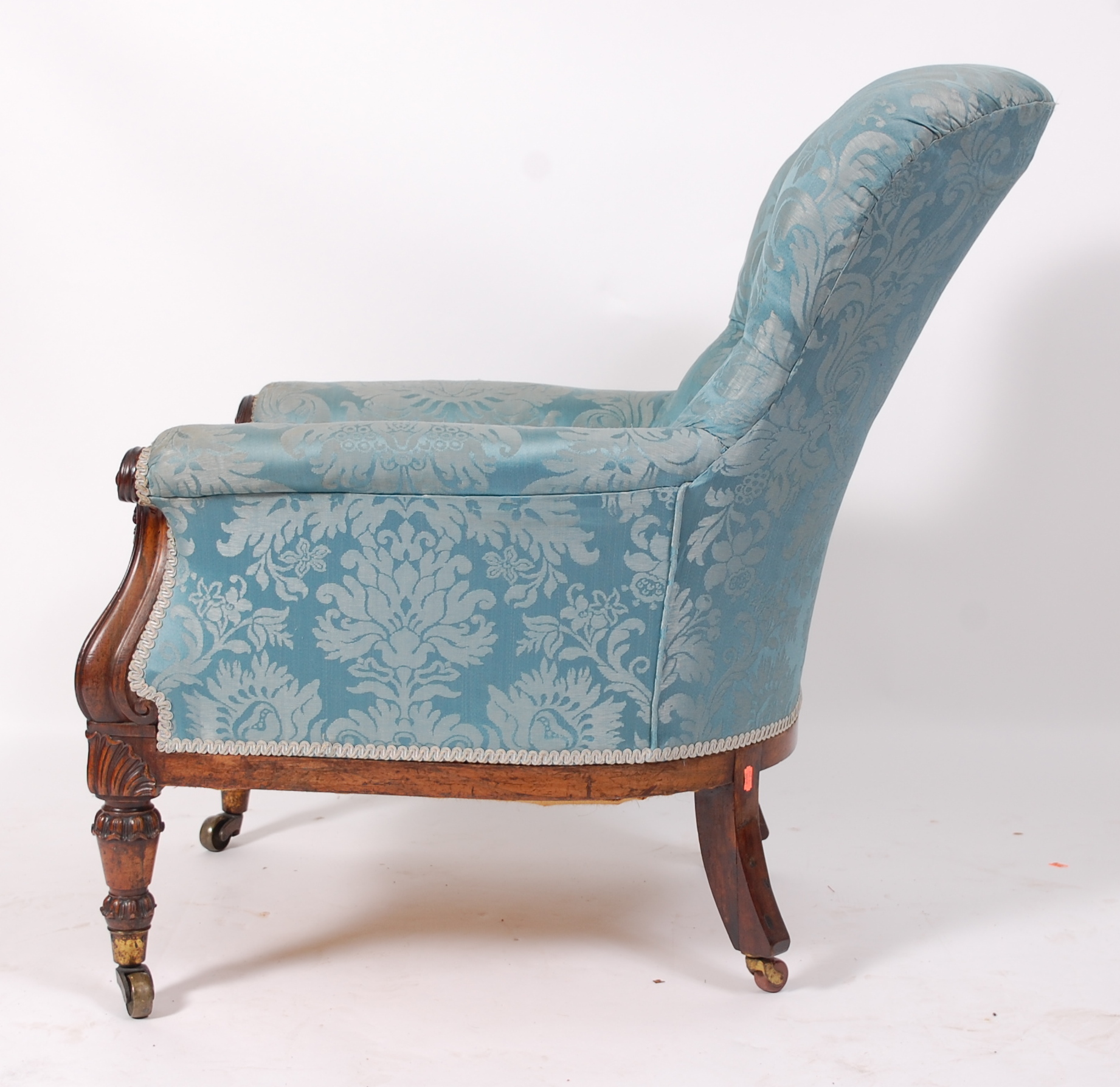 An early Victorian rosewood framed spoonback armchair, the whole upholstered in a silk blue - Image 3 of 3