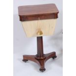 A William IV rosewood round cornered hinge topped pedestal needlework table, having a paper lined