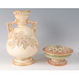 A Worcester porcelain blushware vase, having reticulated handles, applied leaf, fruit and flower