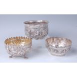 A circa 1900 Indian silver and embossed bowl, decorated in the round with figures, buildings and