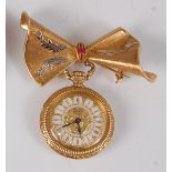 A yellow metal open face lady's manual wind pendant watch, having gilt Roman dial suspended from a