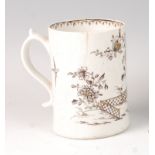 A Lowestoft porcelain tankard, circa 1770, with black pencil sepia and gilt highlighted decoration