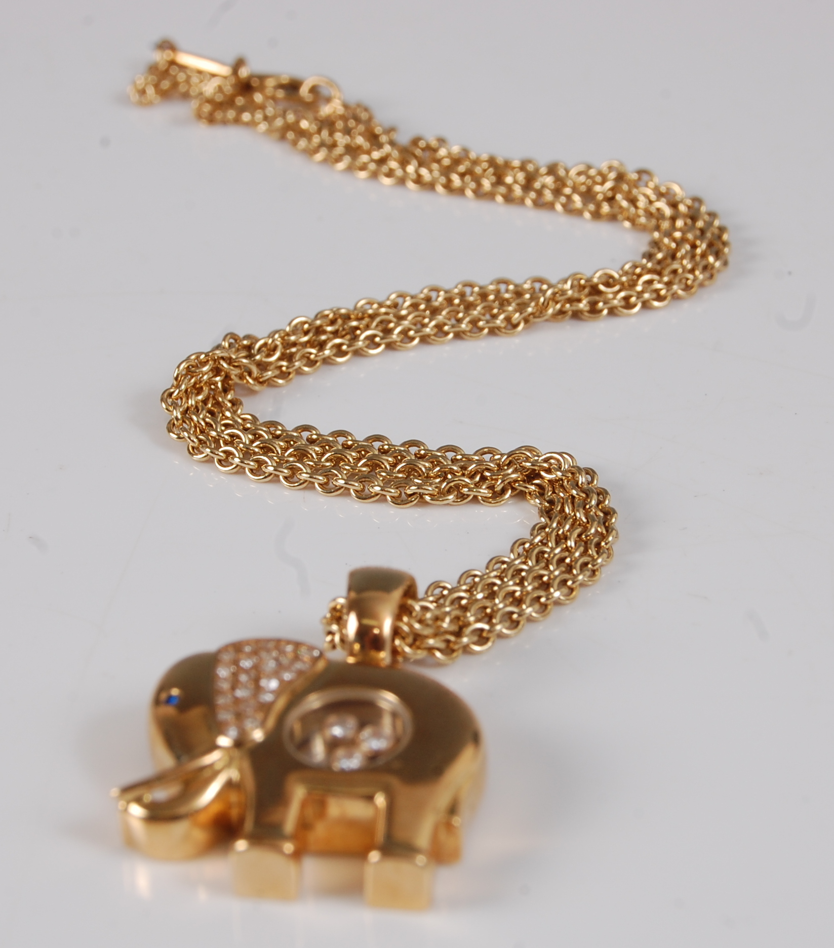 A Chopard 18ct gold Happy Diamonds elephant pendant, the ears pavé set with 24 small brilliant cut - Image 3 of 5