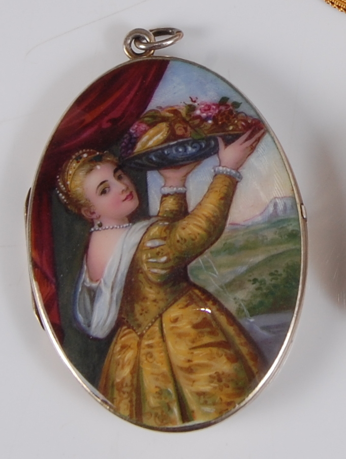 A circa 1900 continental silver gilt and enamel locket depicting three-quarter study of a lady in