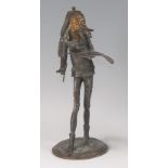 After François Georges - a patinated spelter figural candle holder in the form of a standing