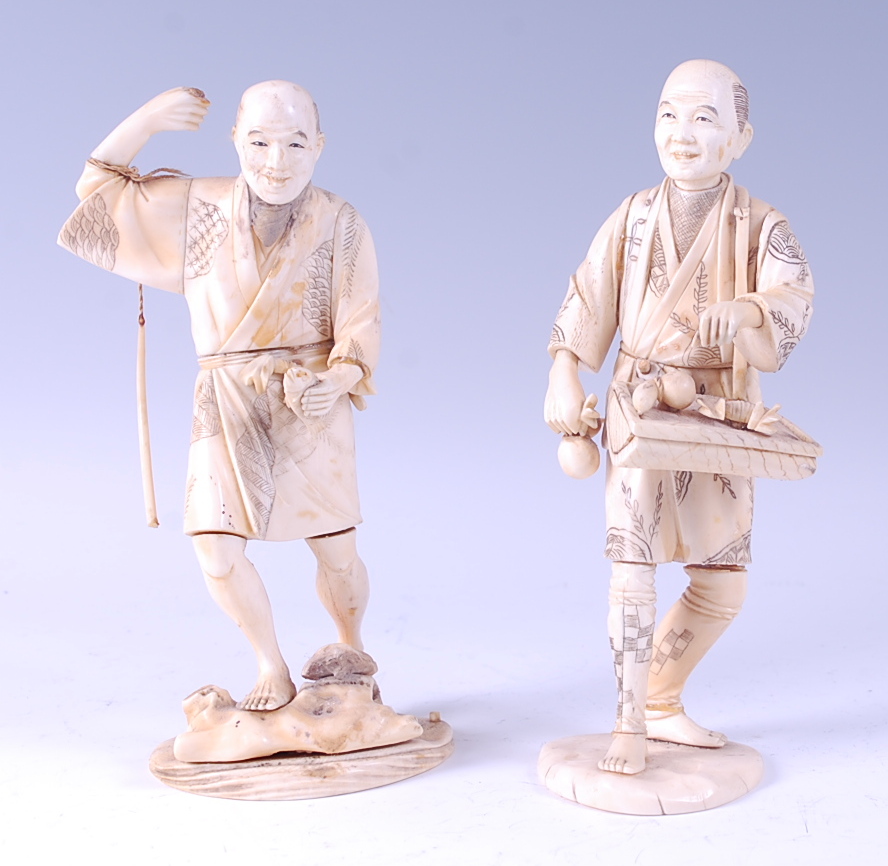 A Japanese Meiji period carved ivory and penwork decorated okimono, of a fisherman in standing pose,