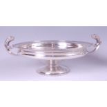 A George V silver footed bowl, having stylised acanthus leaf capped handles, 11.8oz, maker Barker