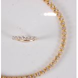 A Middle-Eastern 18ct yellow gold and diamond set tennis bracelet by Damas, with matching half