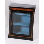A late Victorian ebonised amboyna pier cabinet, of small proportions, having gilt metal chutes and
