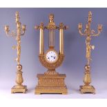 A large mid-19th century French gilt bronze three-piece clock garniture, the lyre shaped clock