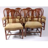 A set of nine George III mahogany dining chairs, the hooped backs above pierced vase splats,