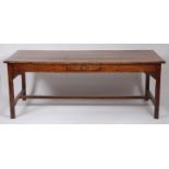 A provincial joined elm and oak farmhouse plank topped refectory table, having cleated ends,