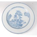 A 19th century Chinese export blue and white plate, of good size, underglaze blue decorated with