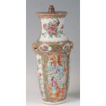 A late 19th century Chinese Canton enamel decorated stoneware vase, having twin gilt decorated